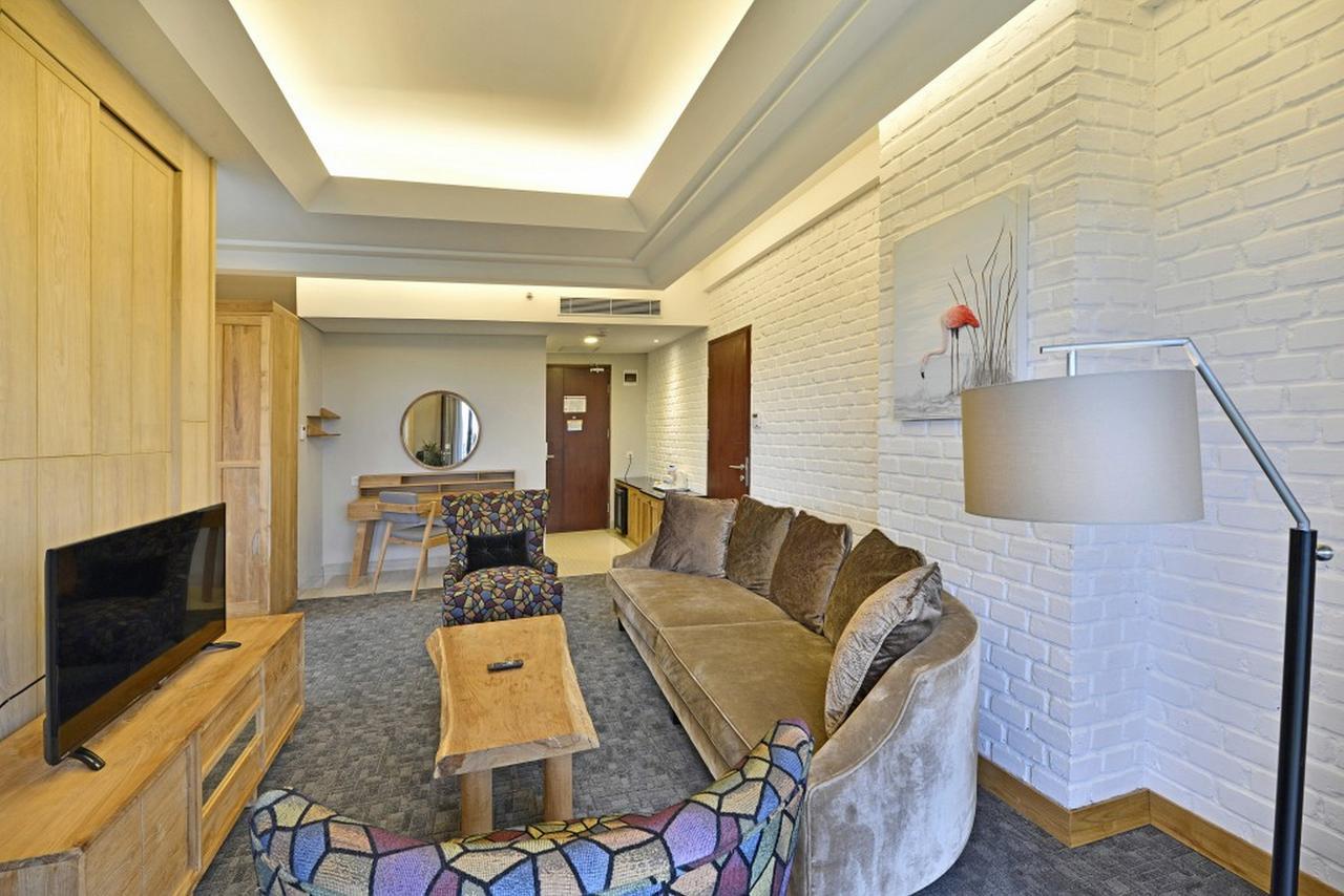 Famvida Hotel Lubuklinggau Стая снимка