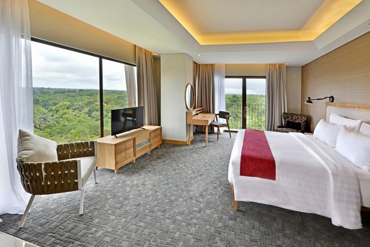Famvida Hotel Lubuklinggau Стая снимка