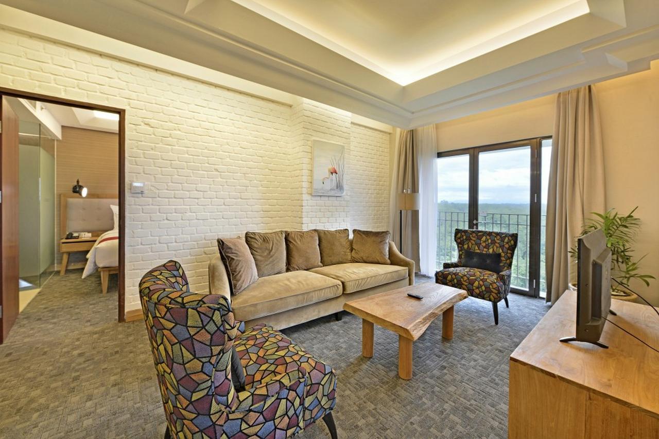 Famvida Hotel Lubuklinggau Стая снимка