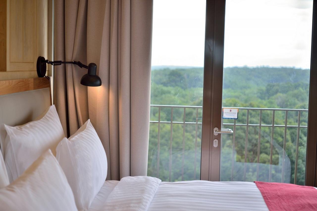 Famvida Hotel Lubuklinggau Стая снимка
